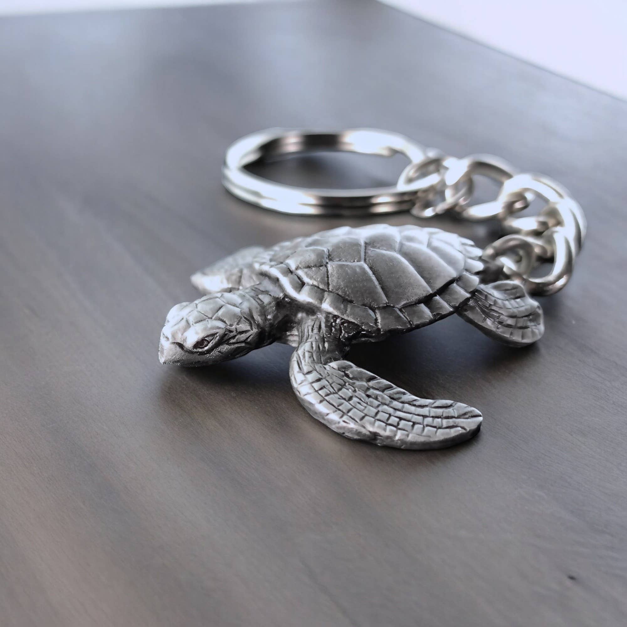 Roland St John sea turtle pewter keychain detail