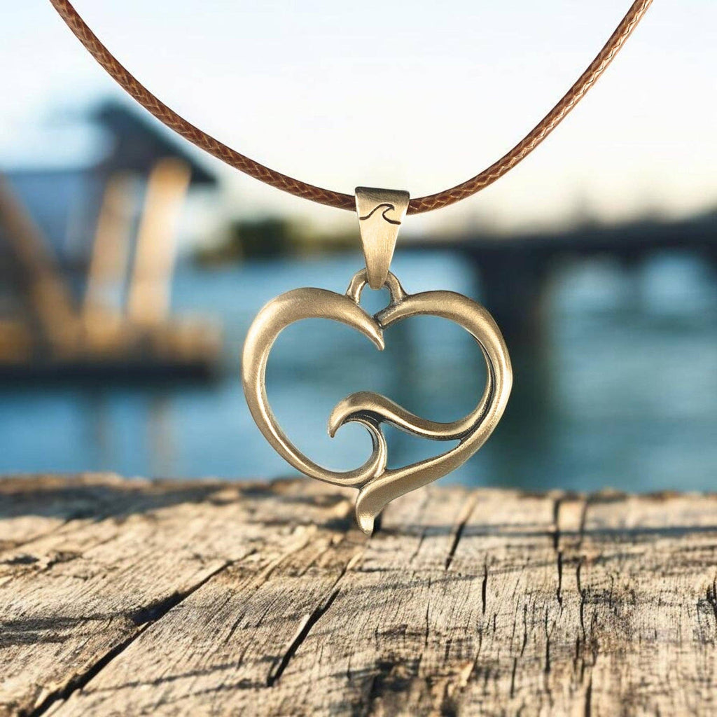 Roland St John ocean wave heart bronze pendant on 18-inch cord